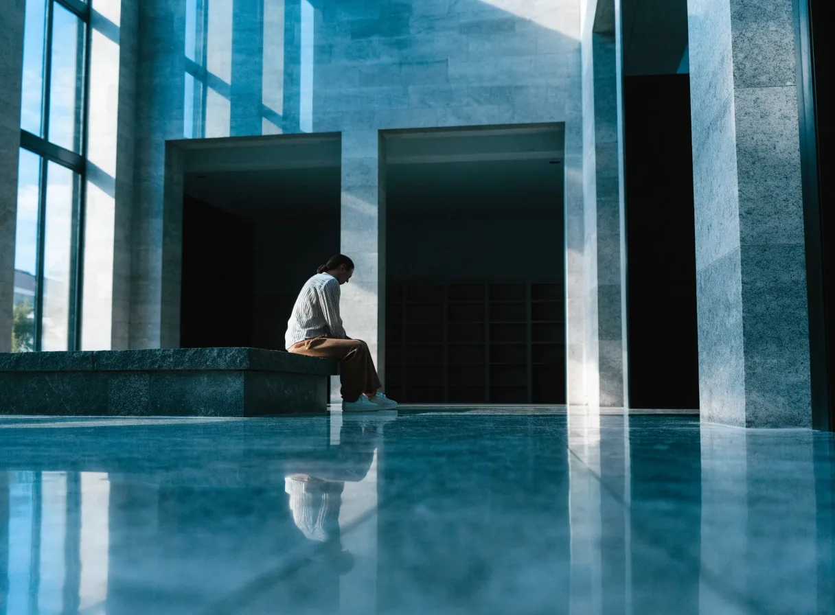 Polished limestone floor with window reflections